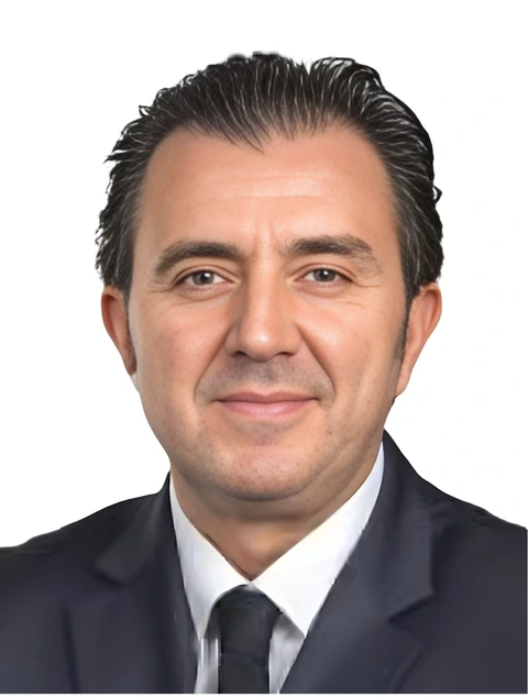 Portrait of Dr Christos Tzivinikos