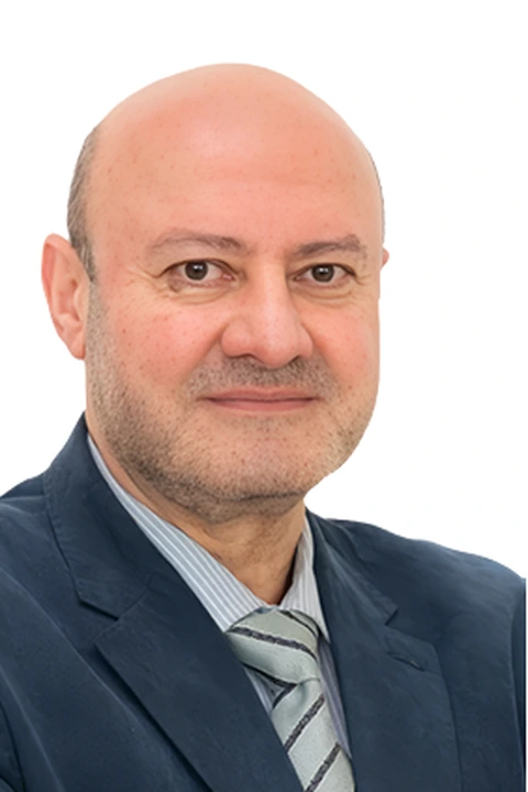 Portrait of Dr Yasser El Ghazzar